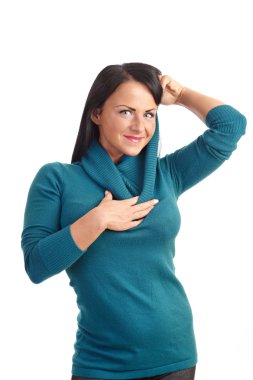 A young woman in a sweater isolated on white