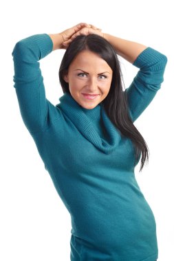 A young woman in a sweater isolated on white