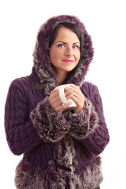 A young woman in a sweater isolated on white