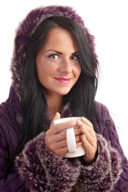 A young woman in a sweater isolated on white