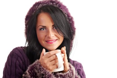 A young woman in a sweater isolated on white