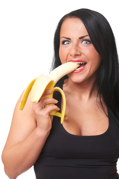 Fitness girl with banana isolated on white — Stock Photo, Image
