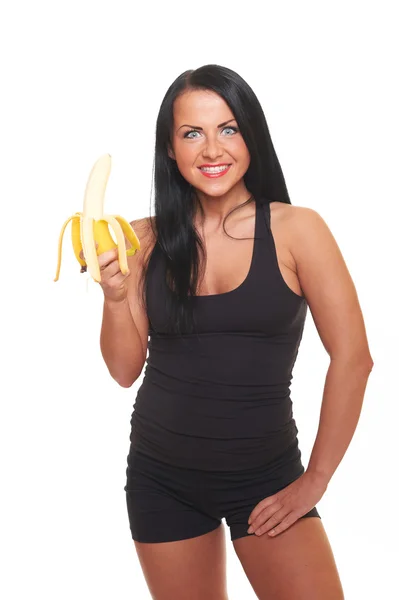 Fitness tjej med banan isolerad på vit — Stockfoto