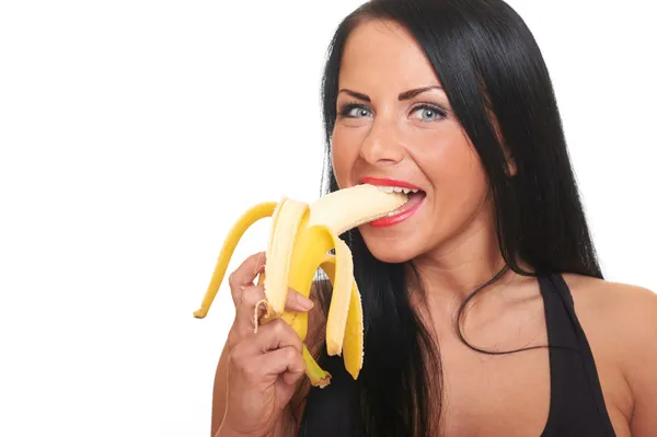 Menina fitness com banana isolada no branco — Fotografia de Stock