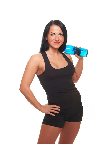 Fitness ragazza con bottiglia d'acqua isolata su bianco — Foto Stock