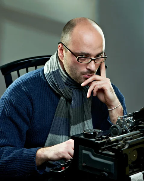 Portrait of a bald writer Stock Picture