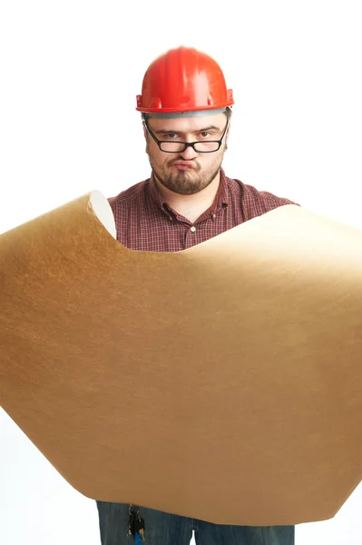 Serious builder in glasses and red hard hat — Stock Photo, Image