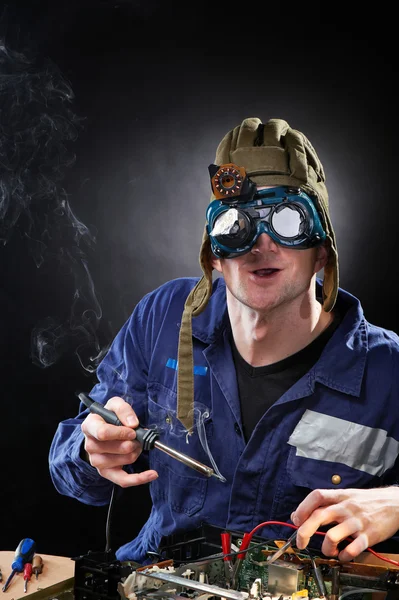 stock image Crazy genious witth soldering iron