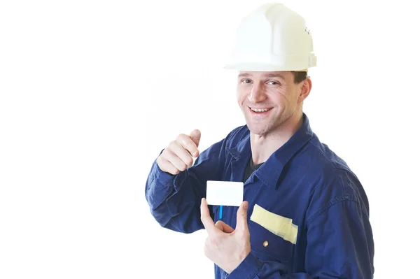 Constructeur homme en robe bleue avec carte de visite — Photo