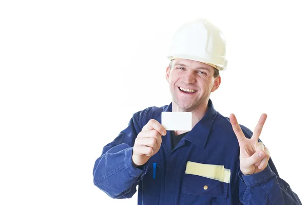 Constructeur homme en robe bleue avec carte de visite — Photo