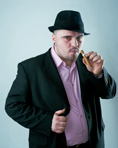 Muž s doutníkem v klobouku — Stock fotografie