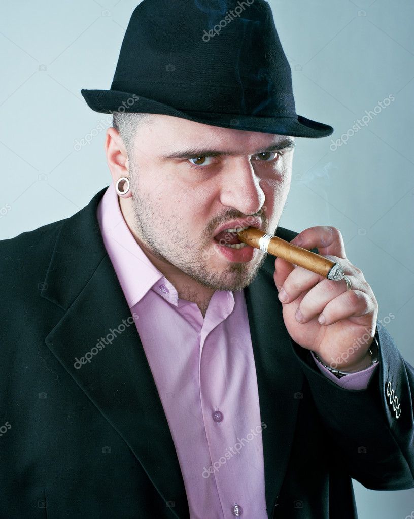 Man with cigar in hat — Stock Photo © dontcut 5123287