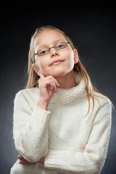 Portrait of a cheerful little girl in eyeglasses — Stock Photo, Image