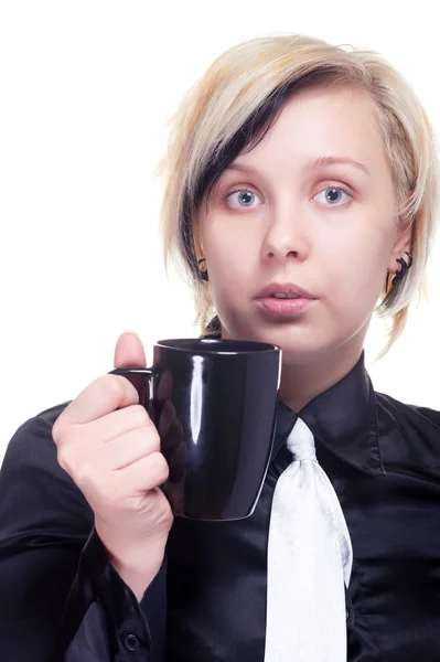 Young woman with cup of hot beverage — Stock Photo, Image