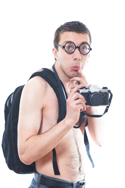 Retrato de um jovem nerd com câmera à moda antiga Fotografia De Stock