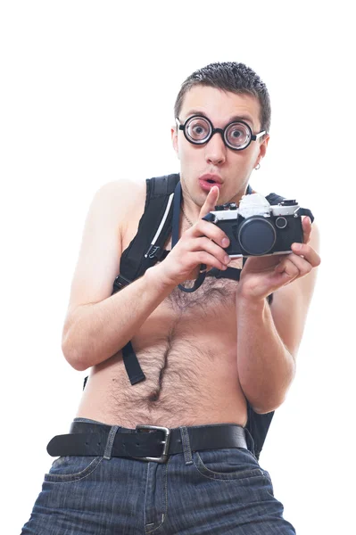 Portret van een jonge nerd met oude ouderwetse camera Rechtenvrije Stockafbeeldingen