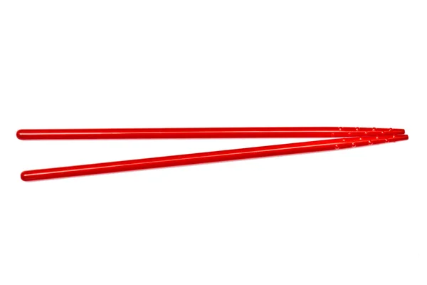 白で隔離される赤い箸 — ストック写真