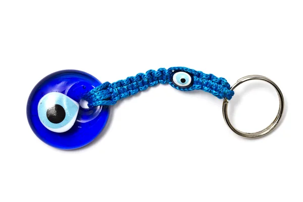 蓝色"猫眼"的钥匙串上白色孤立 — 图库照片