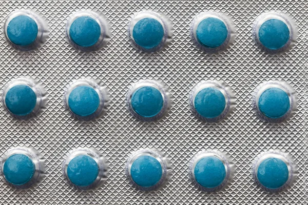 Azul píldoras fondo — Foto de Stock