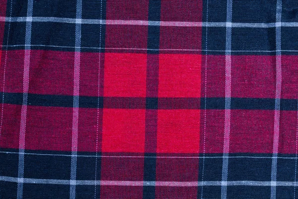Kırmızı-siyah damalı kumaş dokusuna — Stok fotoğraf
