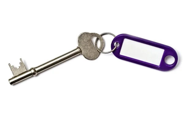 Blank tag and a key — Stock Photo, Image