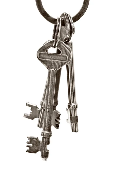 Bir avuç eski anahtarları izole — Stok fotoğraf