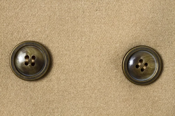 Iki büyük düğmeleri ve kumaş — Stok fotoğraf