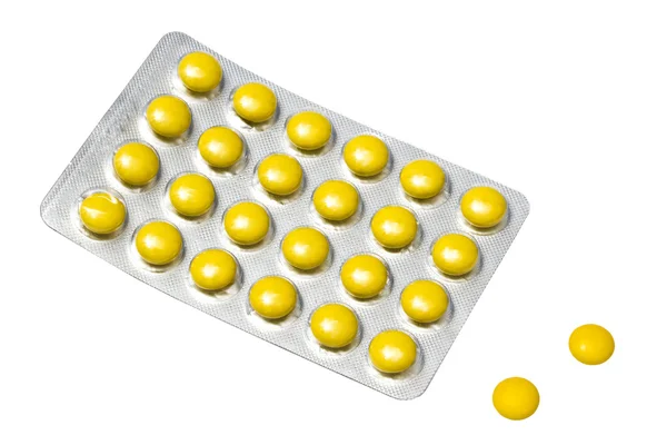 Жовті таблетки — стокове фото