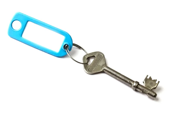 Boş etiket ve üzerinde beyaz izole bir anahtar — Stok fotoğraf