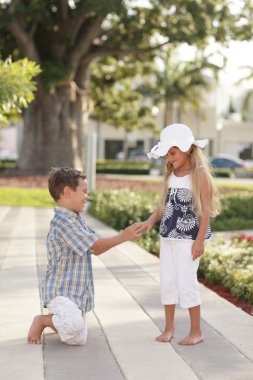 Young boy proposing clipart