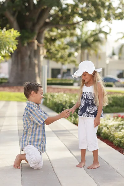 Young boy proposing — Stock Photo, Image