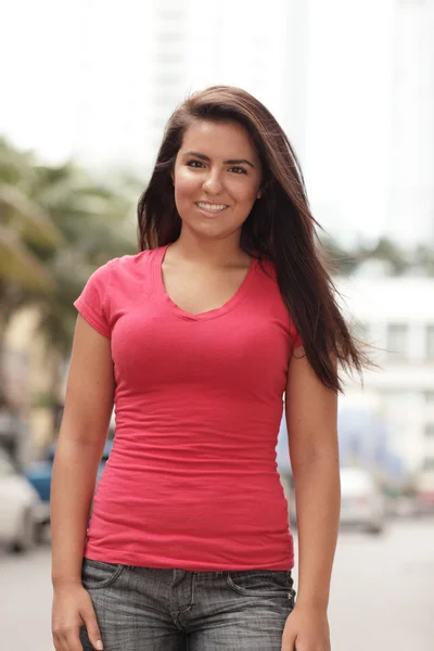 Woman posing in a red shirt — Stock Photo, Image