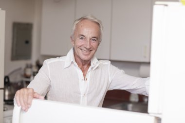 Man opening the refrigerator clipart