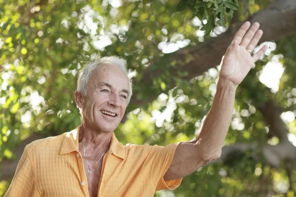 Old man waving — Stock Photo, Image