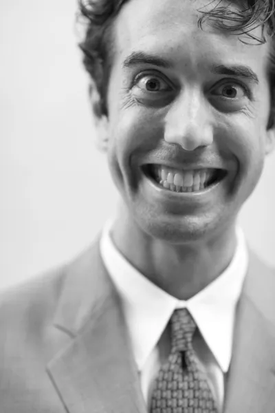 狂った笑みを持ったビジネスマン — ストック写真