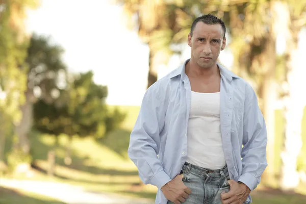 Man with shirt unbuttoned — Stock Photo, Image