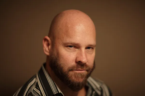 Headshot of a bald man — Stock Photo, Image