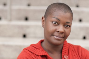 Headshot of a bald black woman clipart