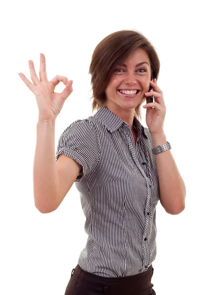 Γυναίκα με τηλέφωνο και εντάξει χειρονομία — Φωτογραφία Αρχείου