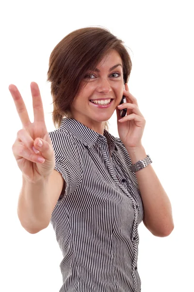 Mulher com telefone e gesto de vitória — Fotografia de Stock
