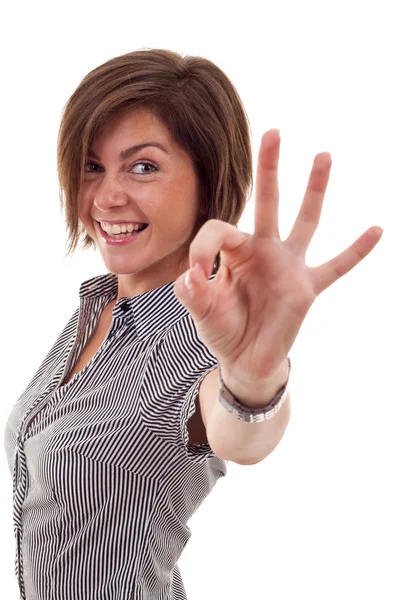 Biznes kobieta wskazuje znak ok — Zdjęcie stockowe