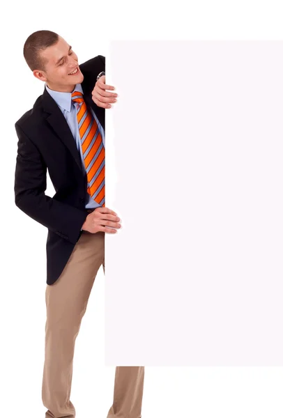 Hombre de negocios sosteniendo cartel en blanco —  Fotos de Stock