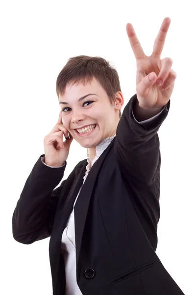 Woman with phone and victory gesture — Stock Photo, Image