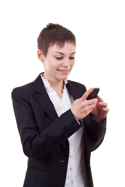 Podnikání žena SMS na telefonu — Stock fotografie