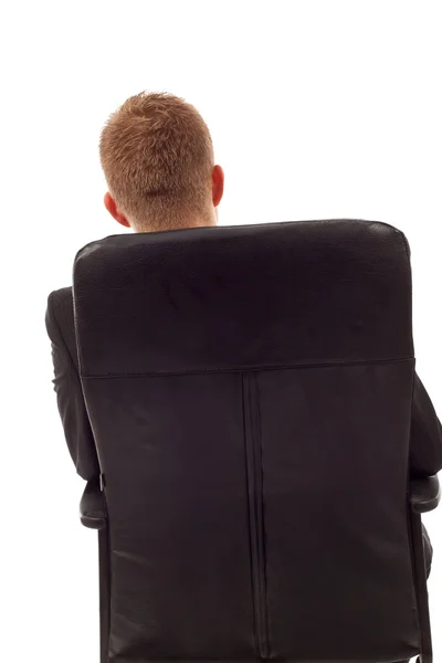 Empresario sentado de espaldas — Foto de Stock