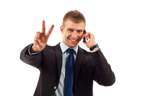 Man maken overwinning teken op telefoon — Stockfoto
