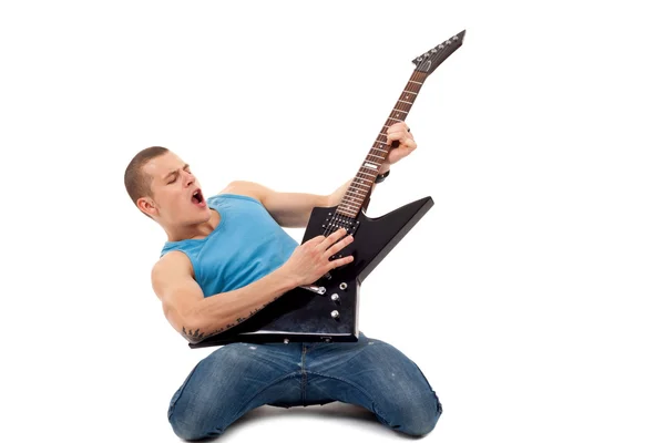 Ο άνθρωπος παίζει κιθάρα. — Φωτογραφία Αρχείου