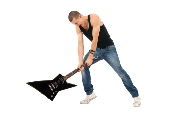 Tentando quebrar uma guitarra — Fotografia de Stock