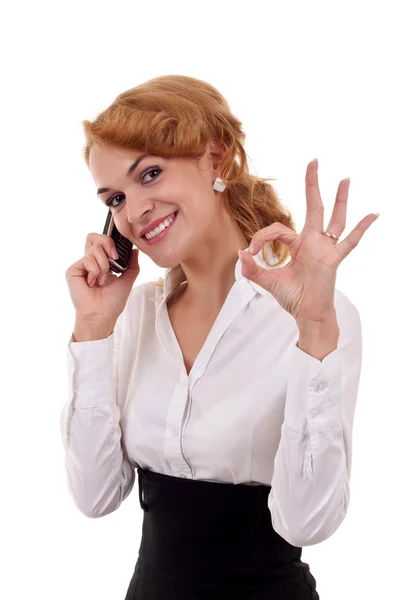 Женщина с телефоном и жестом ОК — стоковое фото