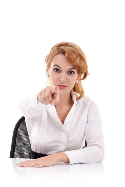 Affärskvinna på skrivbord pekar — Stockfoto